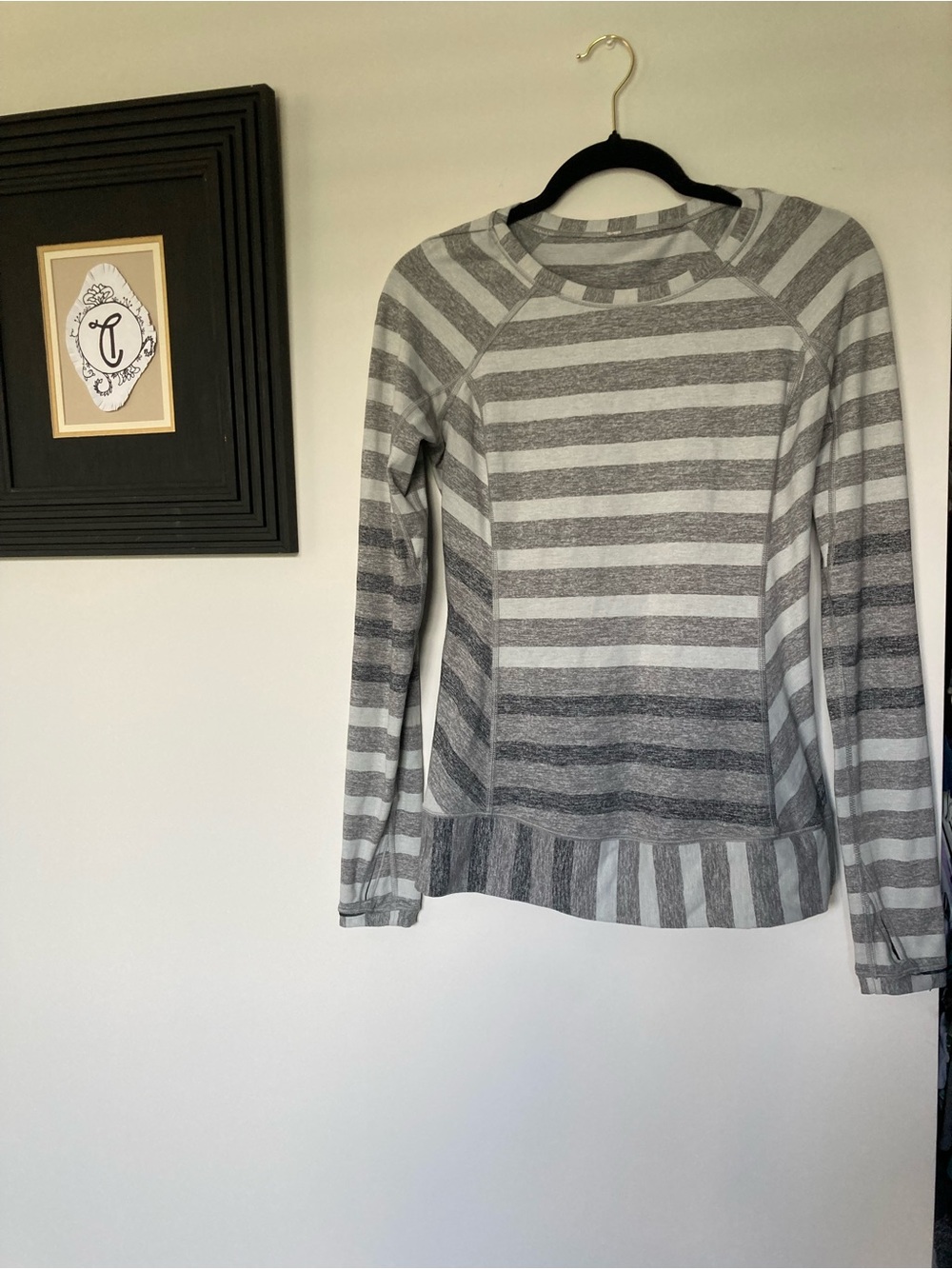 Lululemon Gray Striped Ombre Long Sleeve Top with zipper pocket and thumb holes